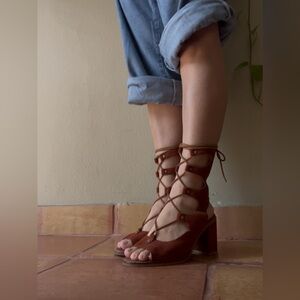 Jeffrey Campbell x Free People Rust Suede Sandals. Heel height: 3 inches.